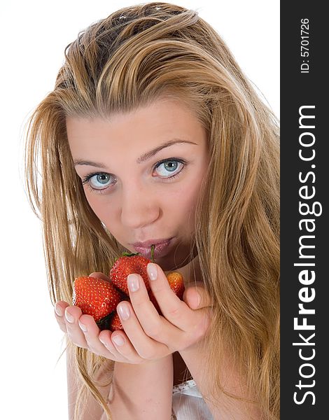 Beautiful girl with strawberry over white