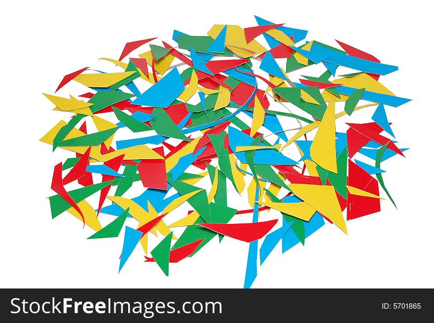 The abstract multi-coloured cut cardboard background. The abstract multi-coloured cut cardboard background