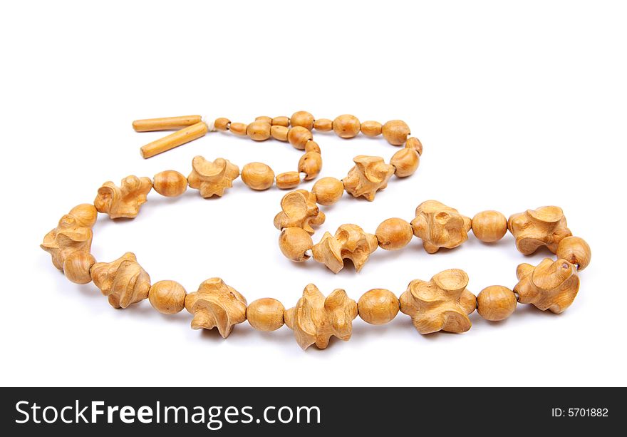 Wooden beads on a white background