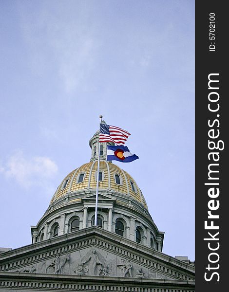 American and Colorado flags on Capitol State building, Denver, Colorado, USA