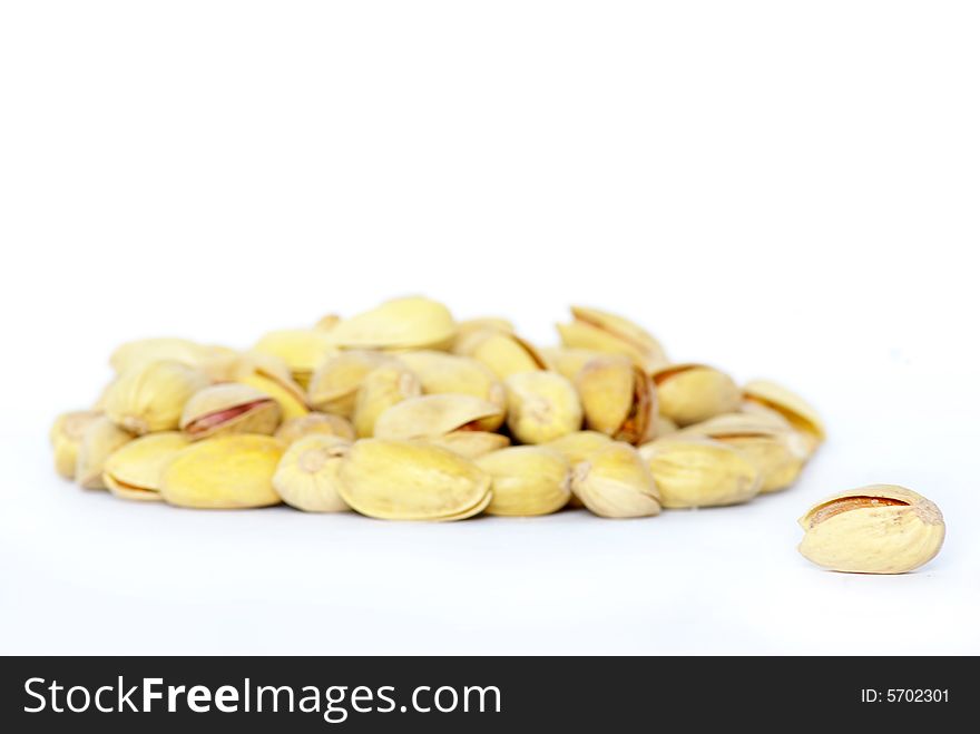 Isolated pistachios on a white background