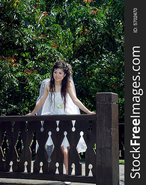 Pretty asian girl image at the rural background