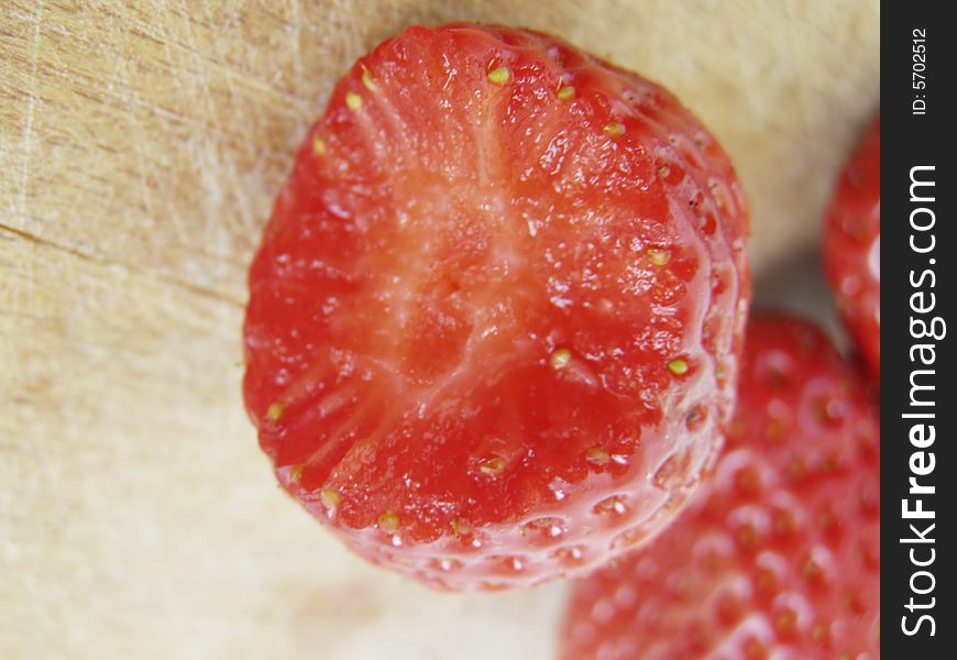 Three shiny strawberries isolated on kitchen wooden board, the front one bitten

*RAW format available. Three shiny strawberries isolated on kitchen wooden board, the front one bitten

*RAW format available