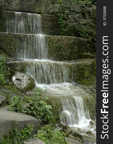 Water on a background of rocks. Water on a background of rocks