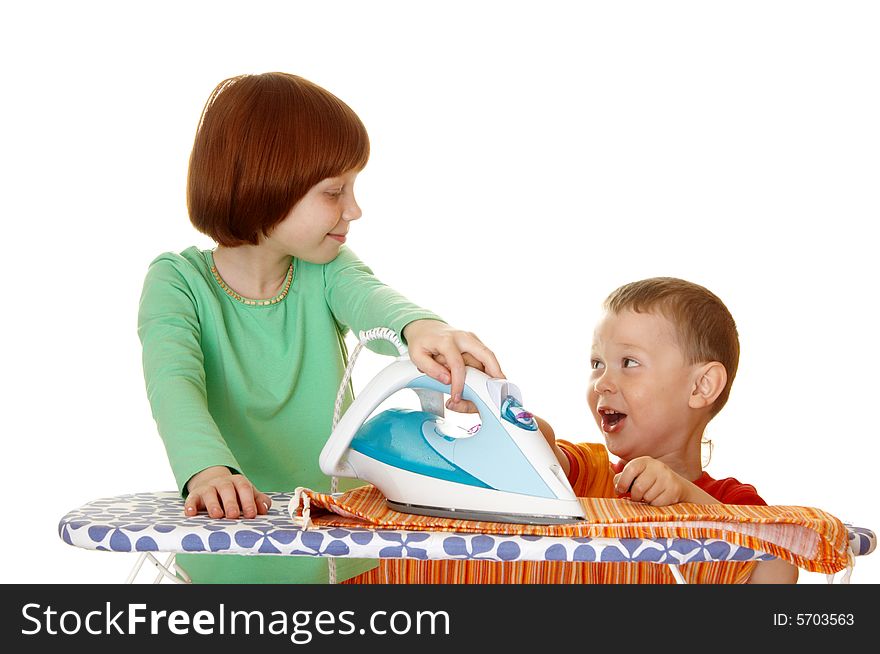 Children iron linen. Photo on a white background