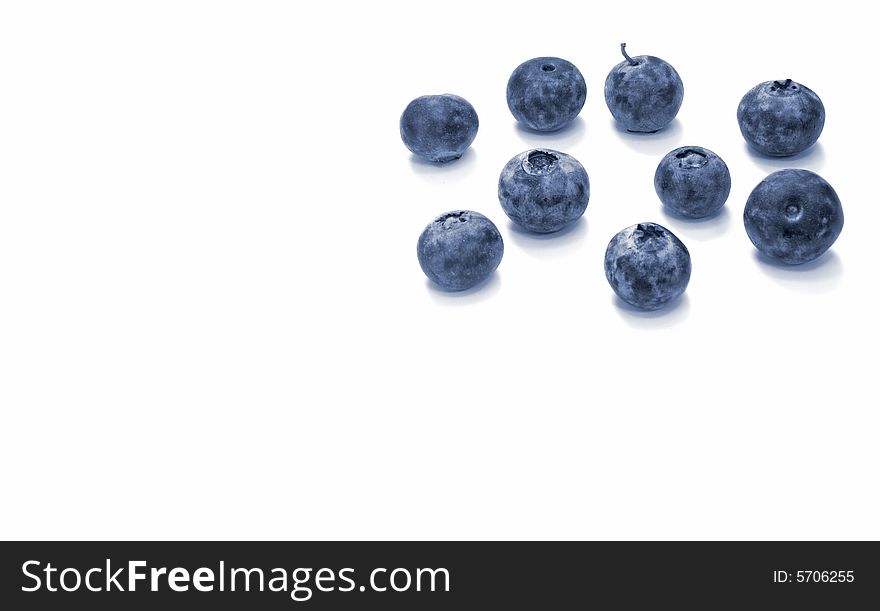 Close-up photo of blueberries on white background