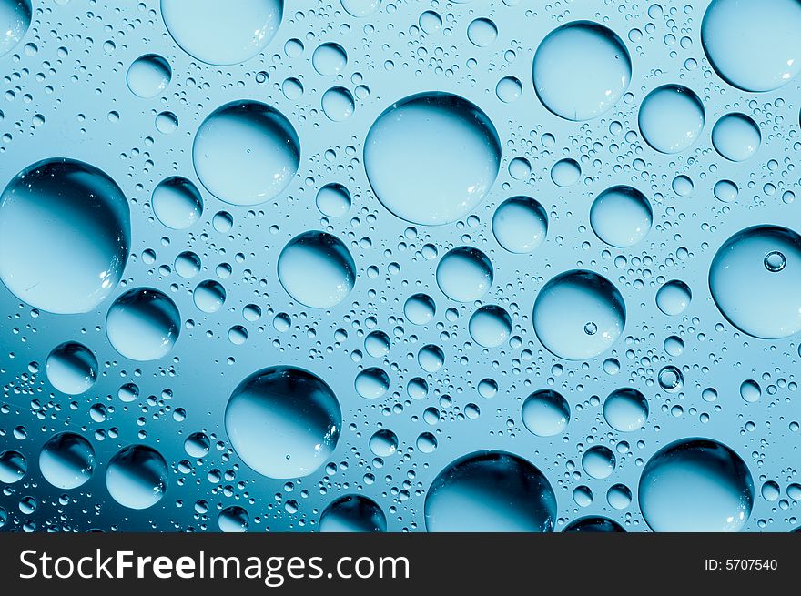 Water drops on glass. Macrophoto.