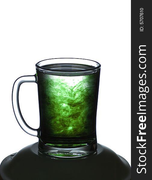 Mug with a green liquid