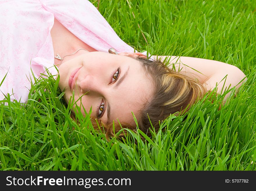 Pretty woman rest on the grass