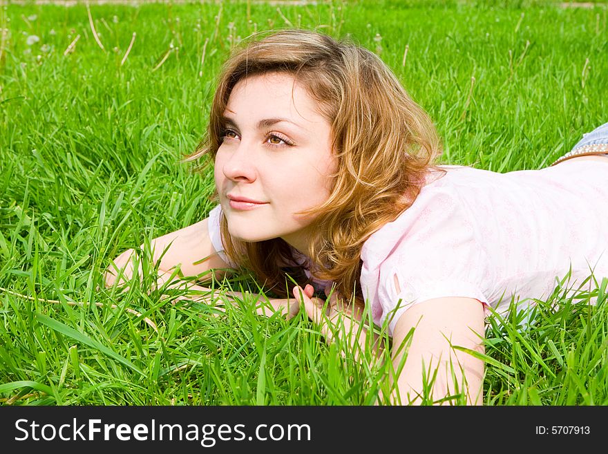 Sweet woman rest on the grass