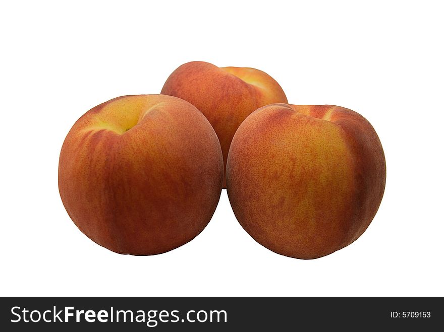 Three peaches on white background