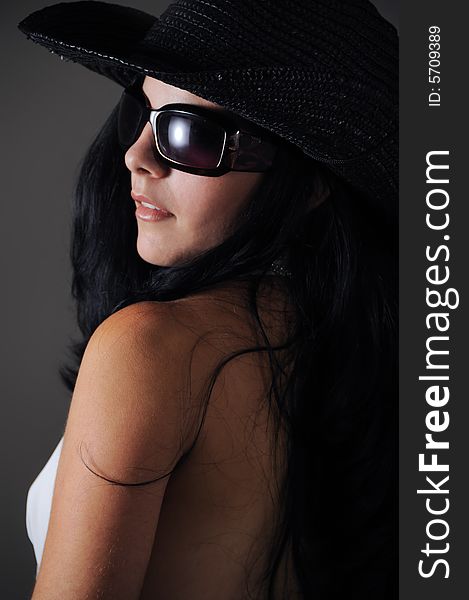 Portrait of hispanic woman wearing sunglasses