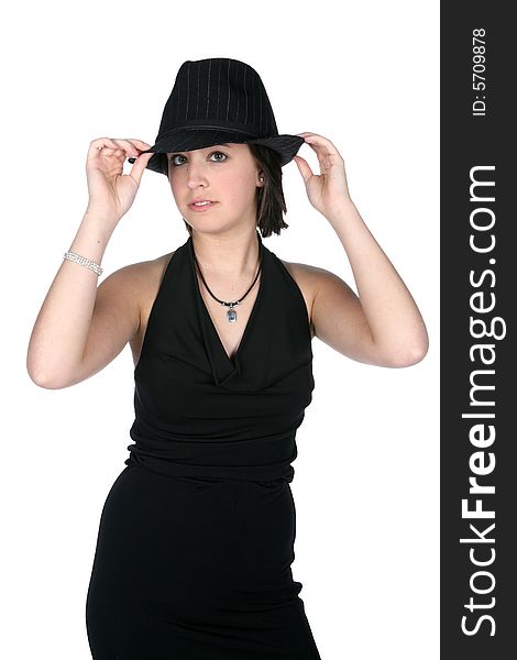 Teenage girl in slim black dress and top hat, looking cute