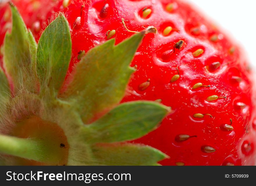 Macro of strawberry with leaves