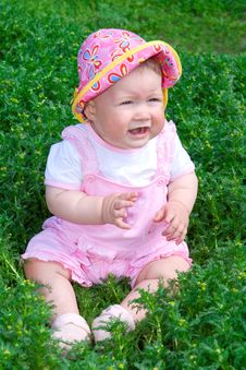 Small Baby On Green Grass Royalty Free Stock Images
