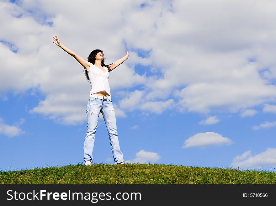 Happy young woman dreams to fly on winds. Happy young woman dreams to fly on winds