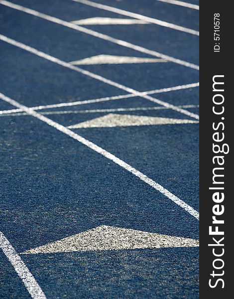 A blue running track at a hight school