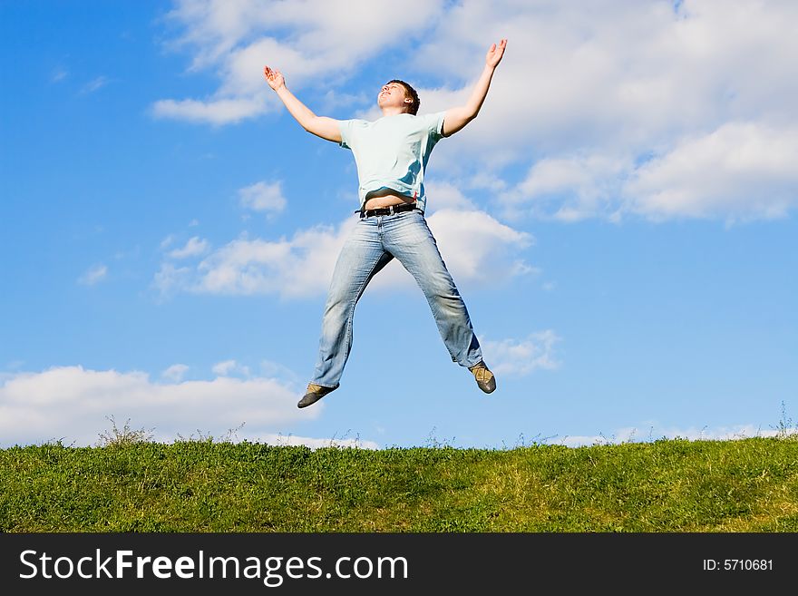 Happy active man is jumping