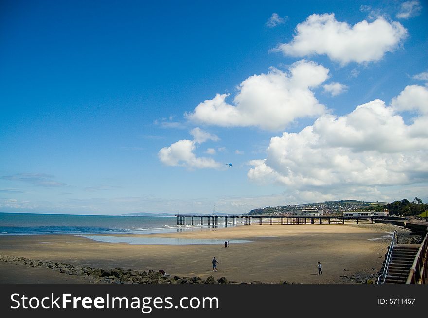 The landscape of the beach and pier at rhos-on-sea in wales. The landscape of the beach and pier at rhos-on-sea in wales