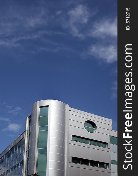 Detail of modern building on blue sky background