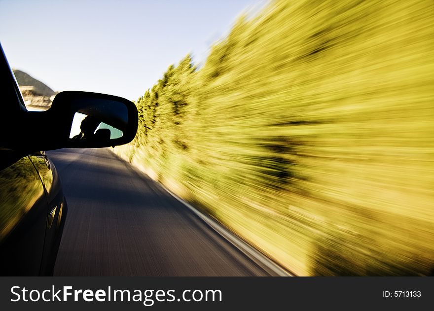 Abstract blurred action from car at high speed.