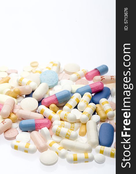 Pills and capsules on white background. Pills and capsules on white background