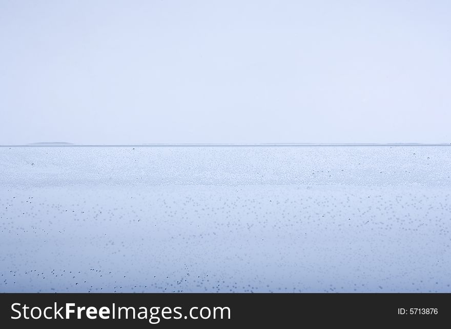 Expanse of water whit little drops on a white background