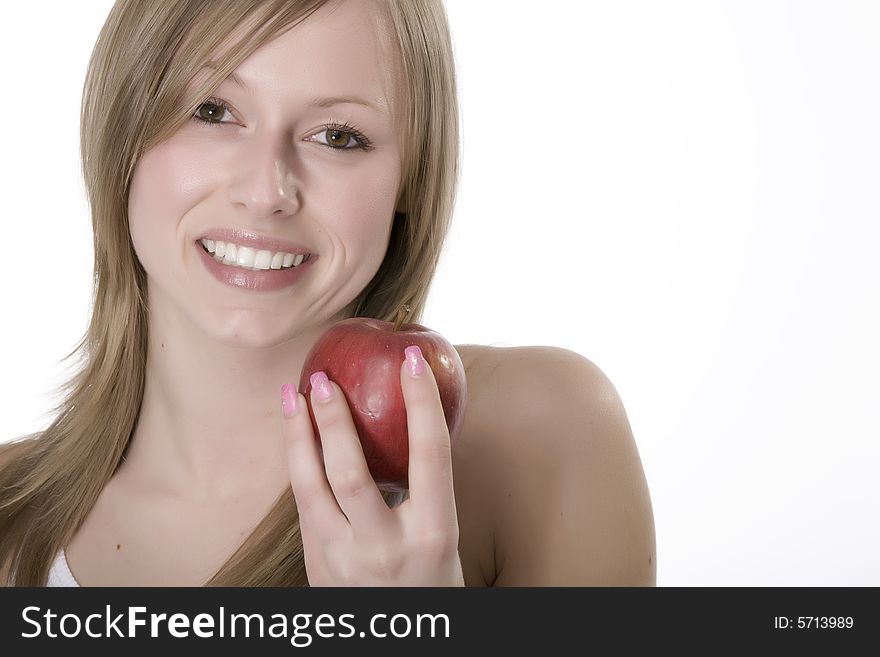 Portrait of a young woman with an apple