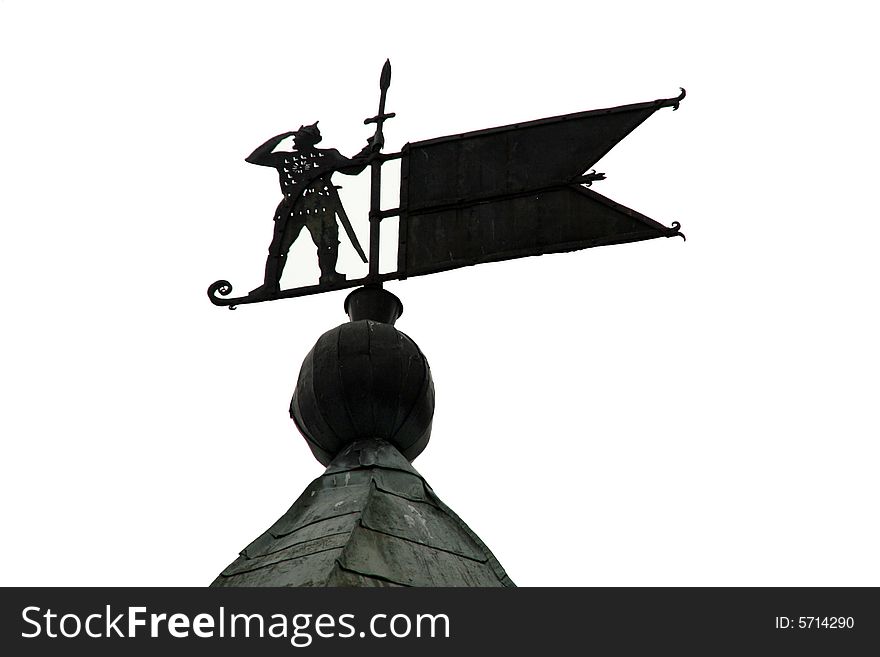 A traditional wind-vane on a roof. A traditional wind-vane on a roof