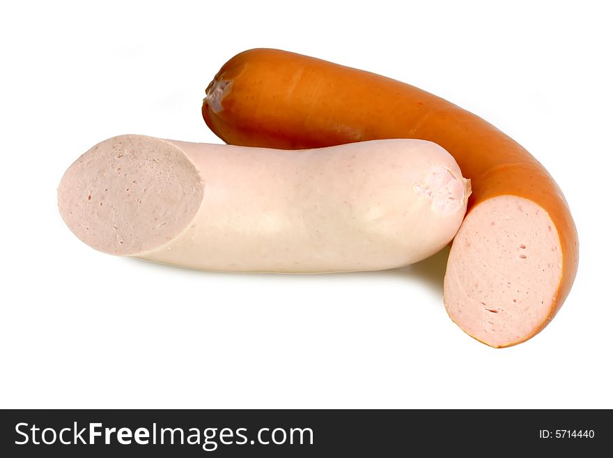 Two sausages on bright background