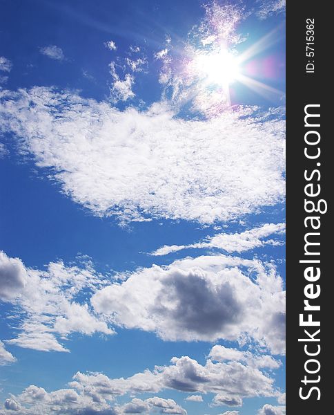 Sun and clouds in a blue sky. Great background