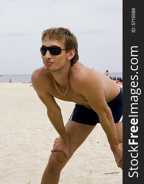 Man playing volleyball on the beach. Man playing volleyball on the beach