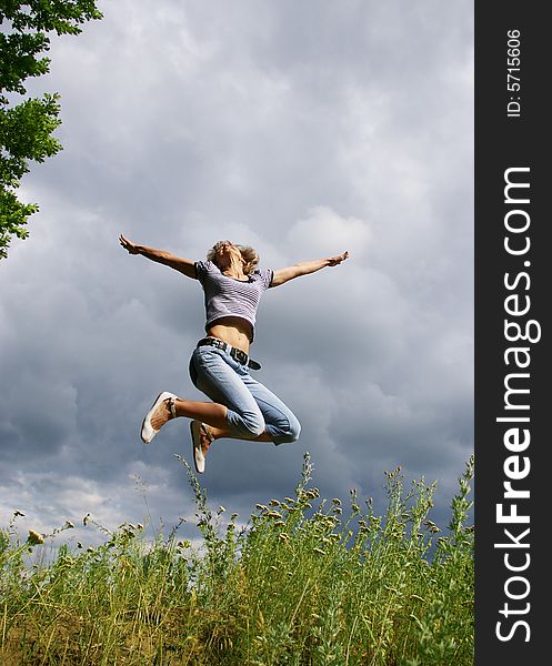 Happy Young Woman Jumps
