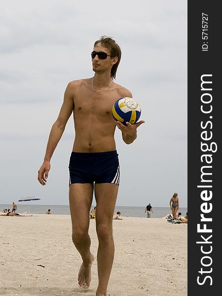 Man with volleyball ball on the beach. Man with volleyball ball on the beach