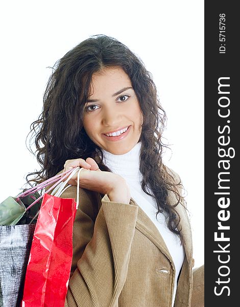 Attractive young happy lady with shopping bags, isolated on white background. Attractive young happy lady with shopping bags, isolated on white background