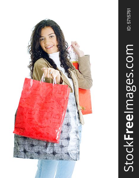 Attractive young happy lady with shopping bags, isolated on white background. Attractive young happy lady with shopping bags, isolated on white background