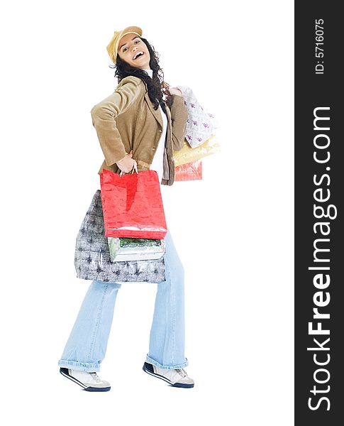 Attractive young happy lady with shopping bags, isolated on white background. Attractive young happy lady with shopping bags, isolated on white background