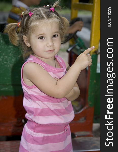 Little girl playing on playground