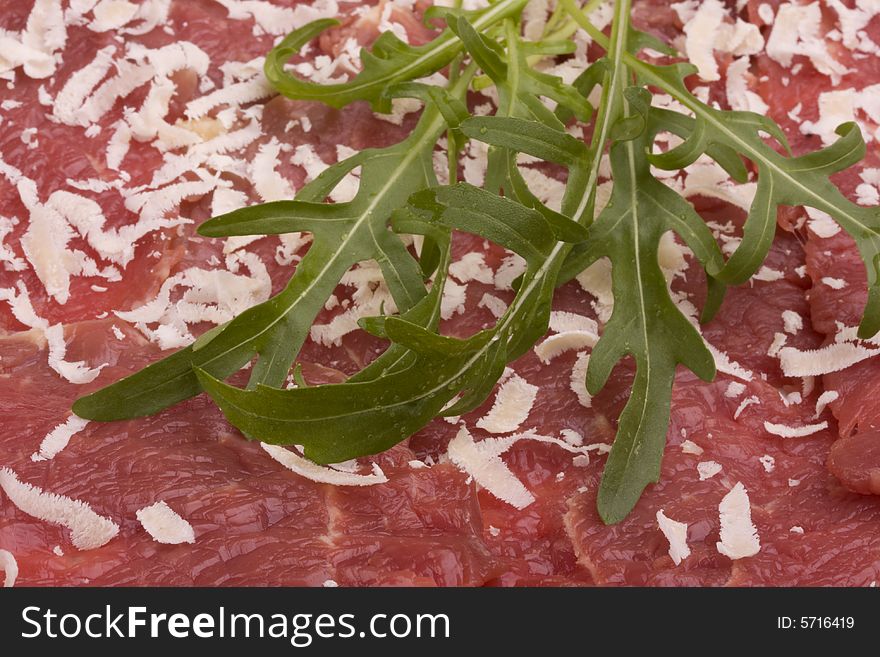 Beef carpaccio with rocket salad