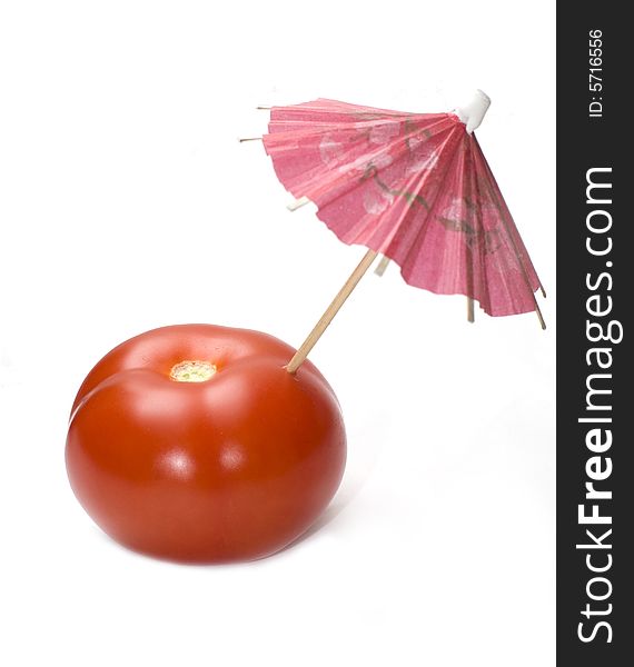 Cocktail with umbrella from tomato isolated on white. Cocktail with umbrella from tomato isolated on white