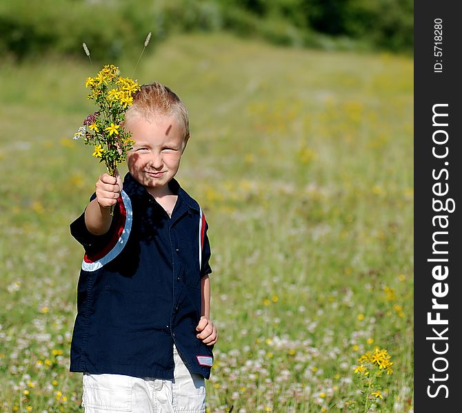 Boy with bouquet of flowers