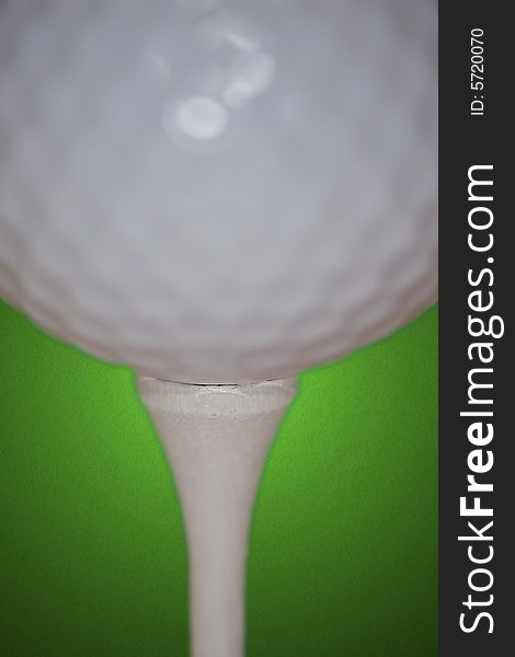 Conceptual image of golf ball on tee