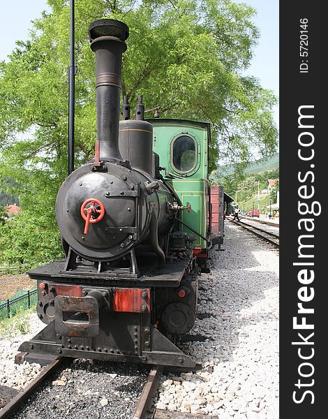 Locomotive on mokra gora on a sunny day