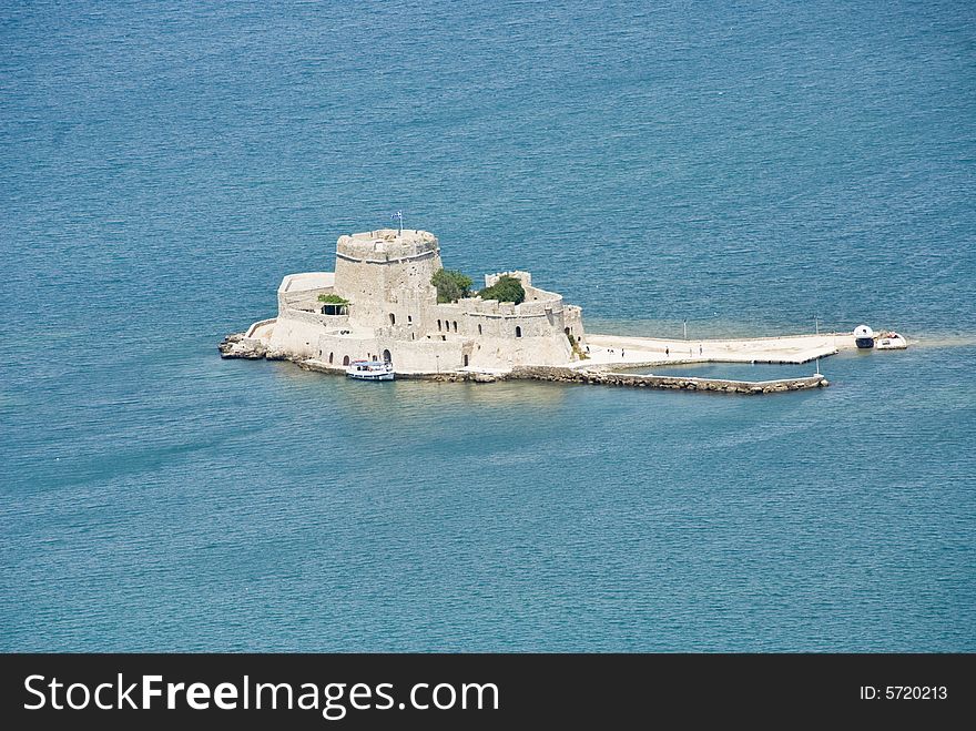 View of the Bourtzi Castle situated in front of the city of Nafplion in the Peloponnese, Greece.