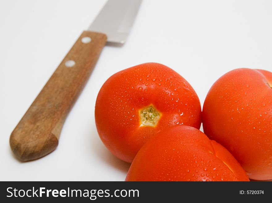 Knife And Tomatoes