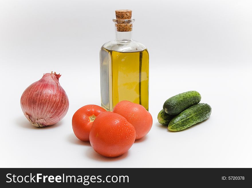Onion, tomatoes, a bottle of oil - all for salad