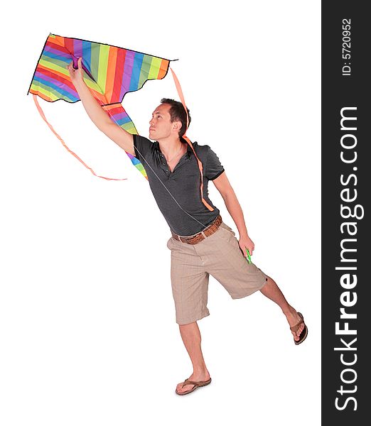 A young man starts kite