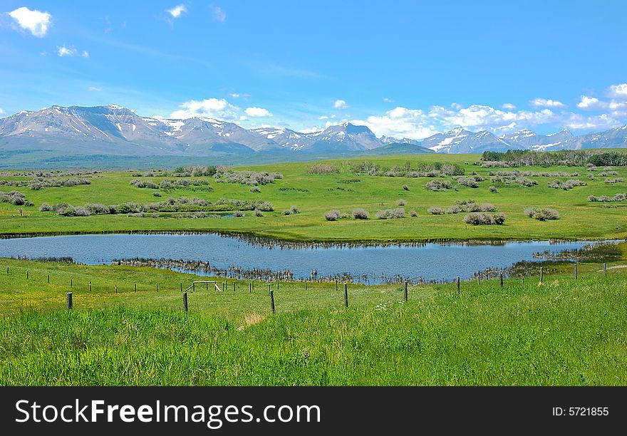 Mountains, Meadows And Pond