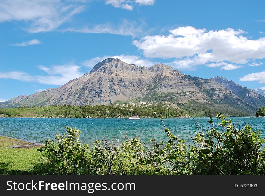 The waterton lake and lakeside mountains, alberta, canada. The waterton lake and lakeside mountains, alberta, canada