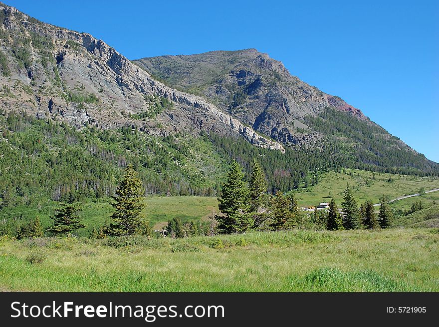 Mountains and hillside grassland in waterton lakes national park, alberta, canada. Mountains and hillside grassland in waterton lakes national park, alberta, canada